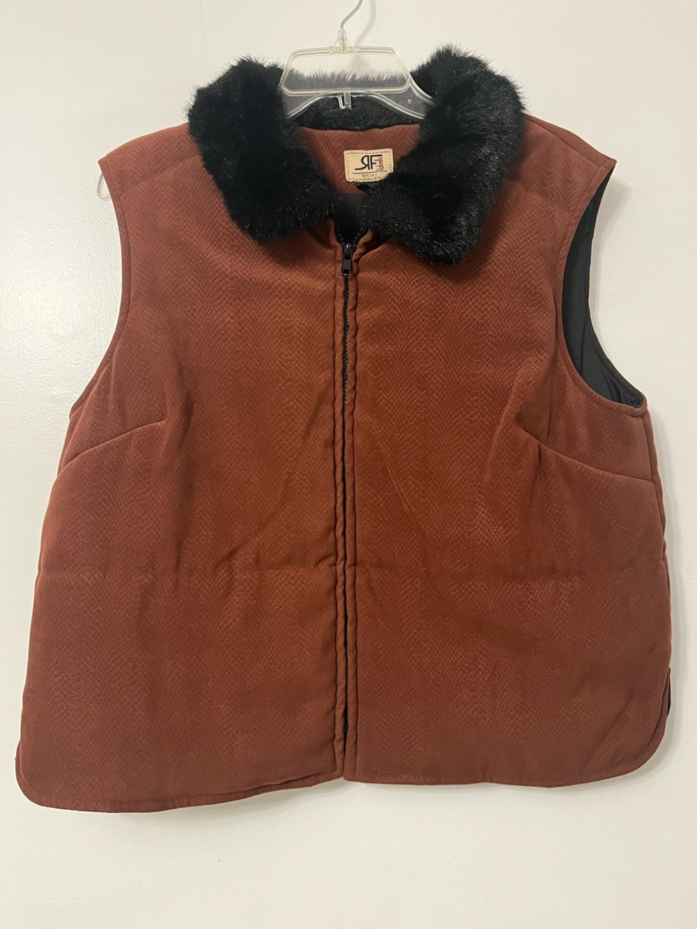 Rafaella Sport zip-up vest complete with a cozy black faux fur collar